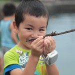 Enjoying touching insects in Nagasaki.