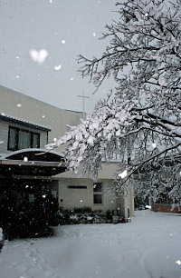 snowing on the church