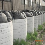The piled contaminated soil containers in residential area in Koriyama-city. There is　still nowhere to dispose at present.